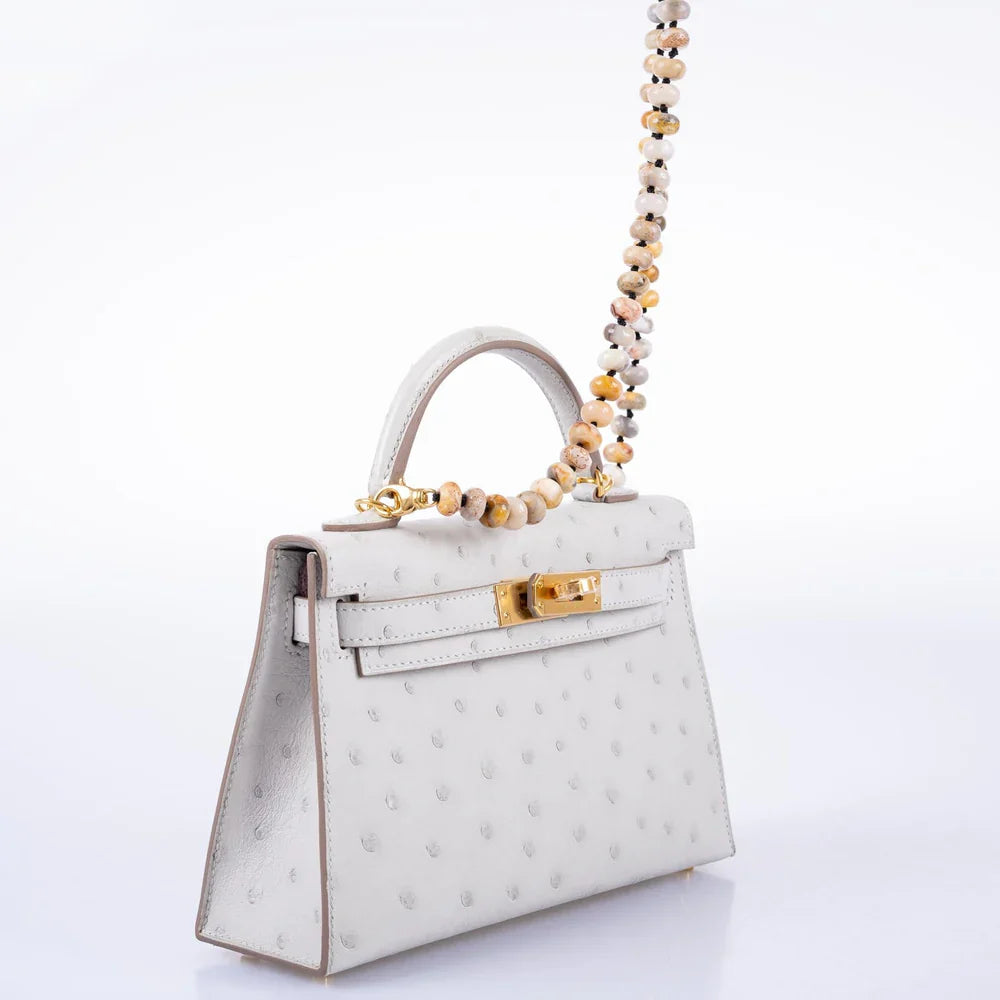 KELLY 20 MINI II SELLIER GRIS PERLE OSTRICH WITH GOLD HARDWARE