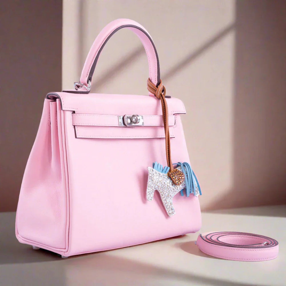 KELLY 25 RETOURNE ROSE SAKURA SWIFT LEATHER PALLADIUM HARDWARE